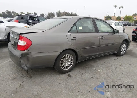 2002 Toyota Camry Le from USA, damaged, VIN JTDBE32K520097841